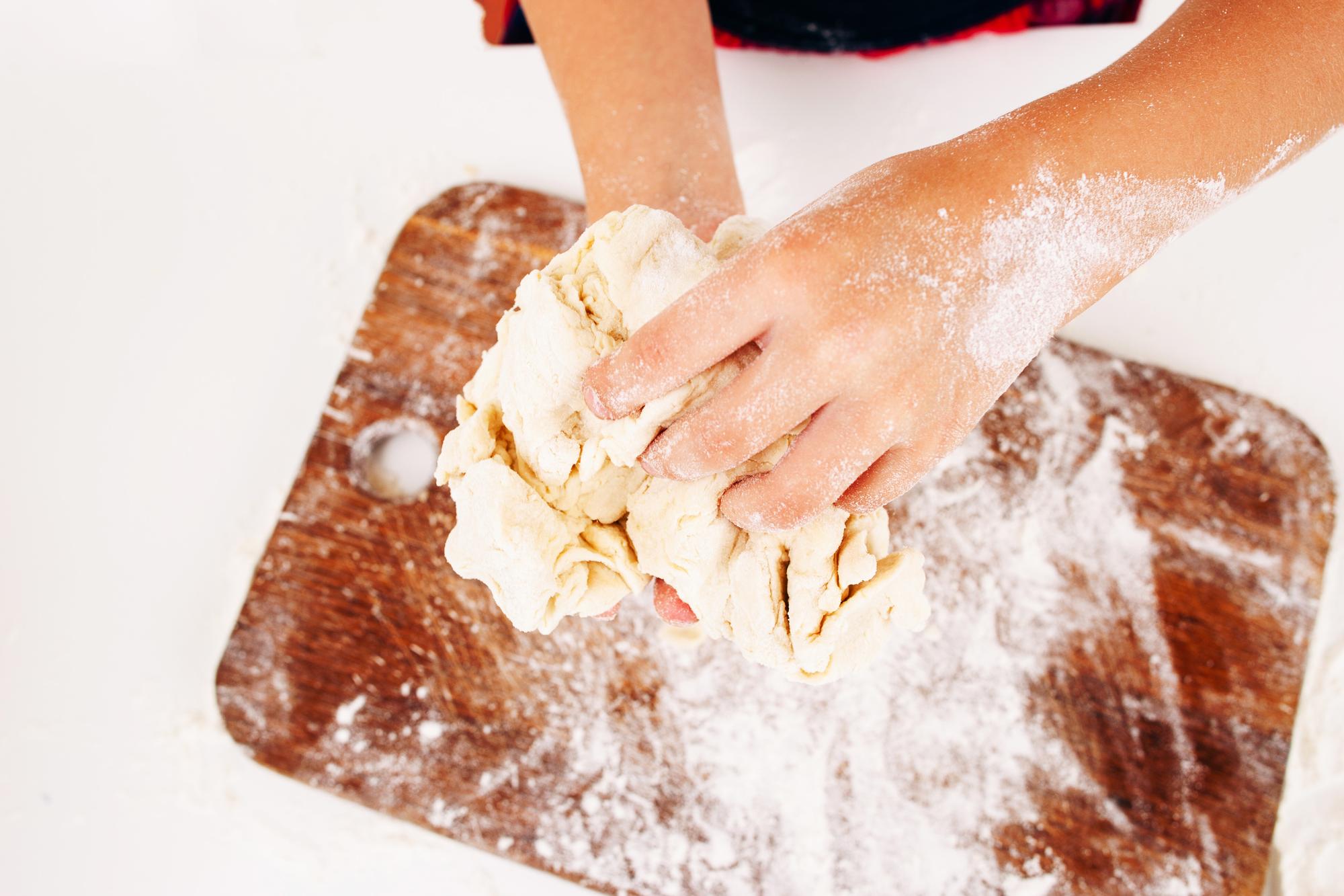 Student preparing fresh pasta
